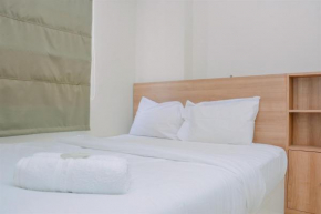 Chic and Cozy 2BR Apartment at Bassura City By Travelio